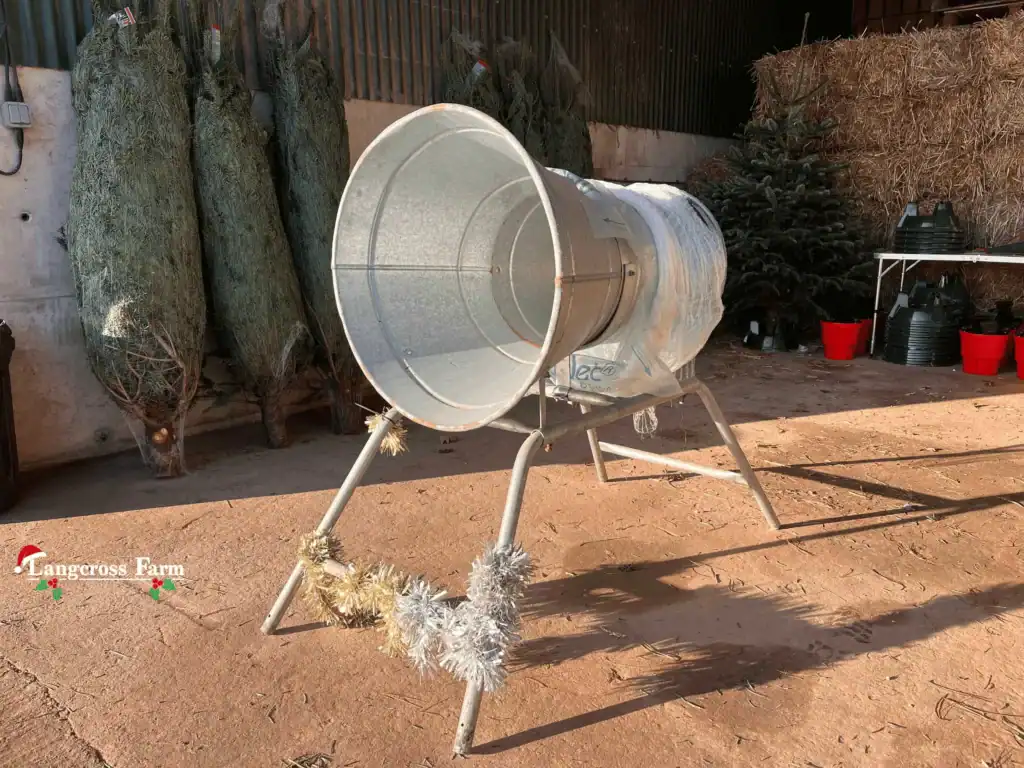 Galvanised metal Christmas tree stand at Langcross Farm, ideal for festive decoration and outdoor holiday displays.